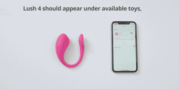 Lovense Lush 4 beside a phone for app connection setup